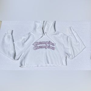 A heavy white cropped champion hoodie
